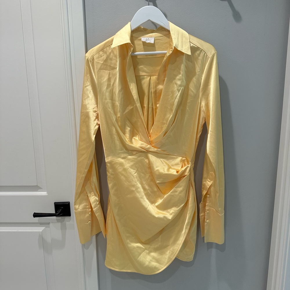 Beautiful yellow silk mini dress.